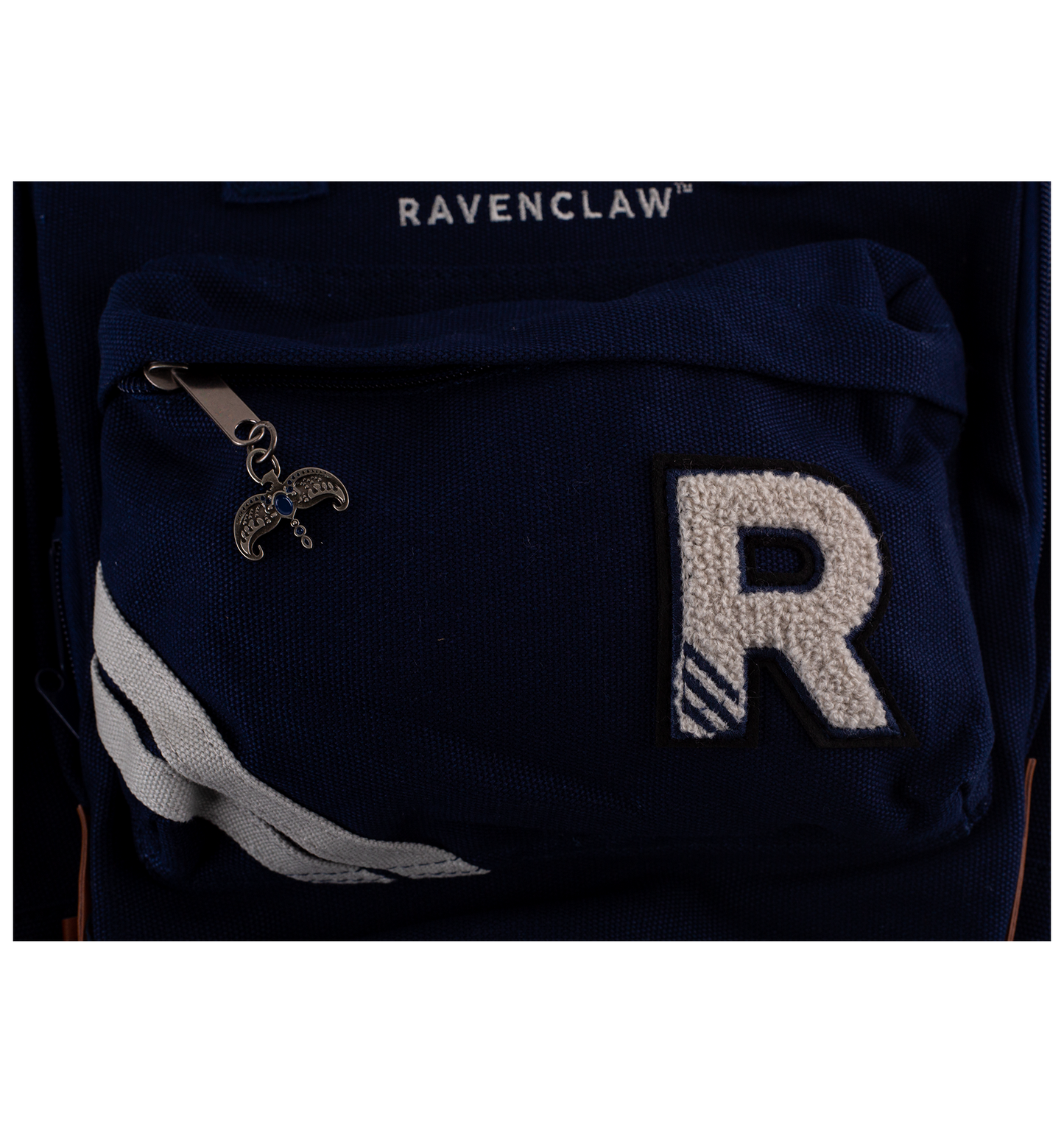 Navy blue bag with 'R' emblem and 'Ravenclaw' text on a white background