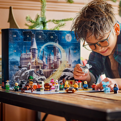 Child playing with a Harry Potter-themed Advent calendar