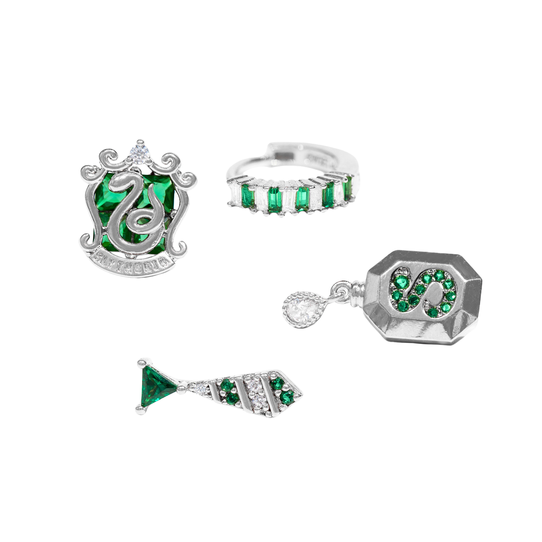 Set of silver Slytherin jewelry with green gemstones on a white background