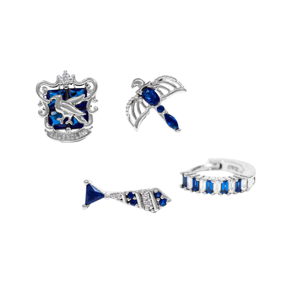 Set of silver and blue Ravenclaw jewelry pieces on a white background