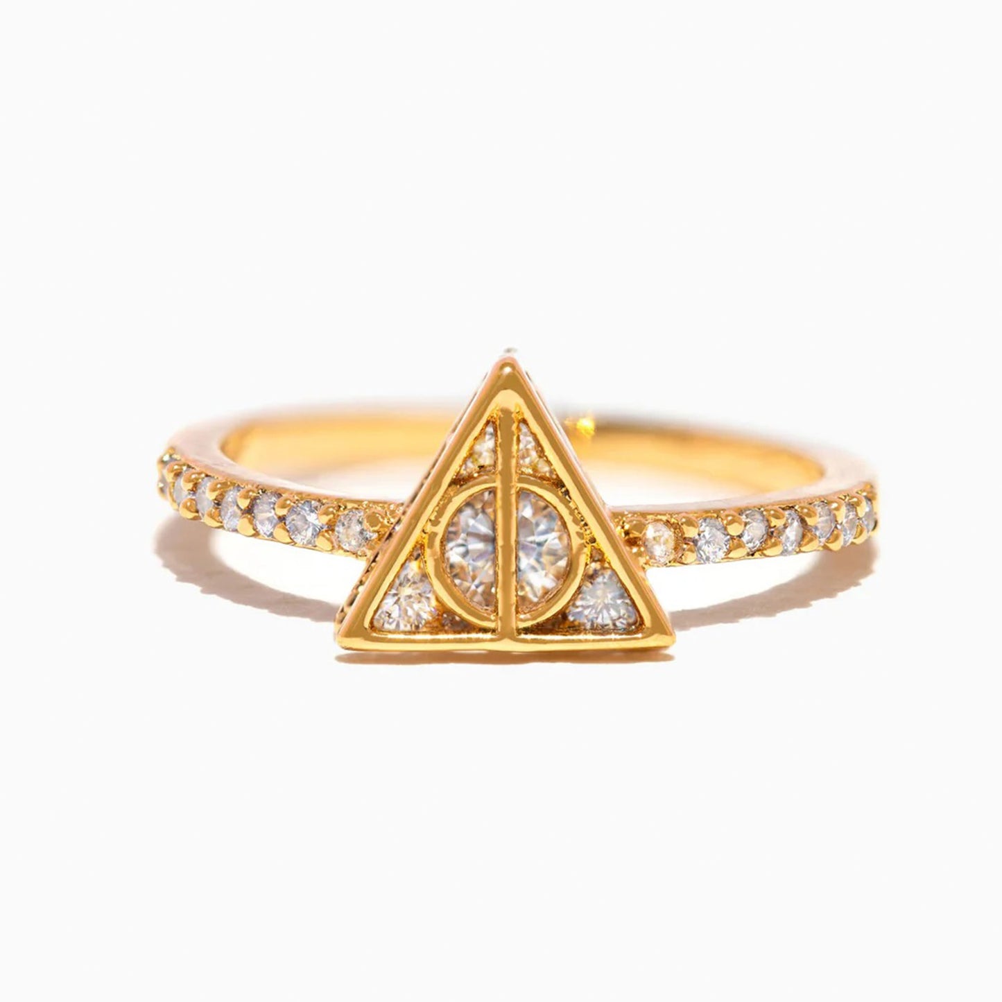 Gold ring with a triangular design and small diamonds on a white background