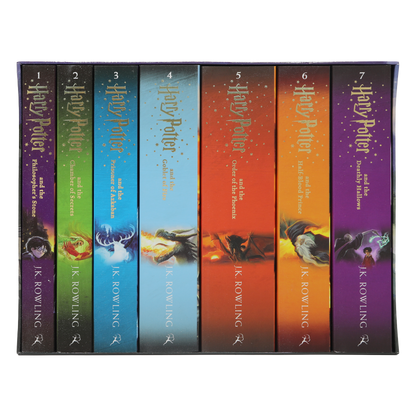 Set of 'Harry Potter' books with colorful covers on a white background