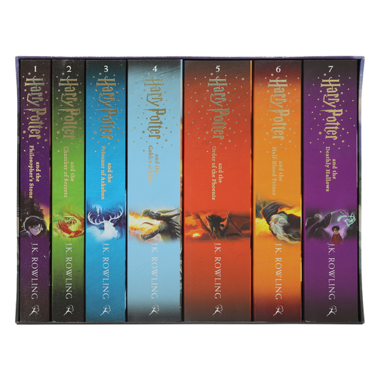 Set of 'Harry Potter' books with colorful covers on a white background