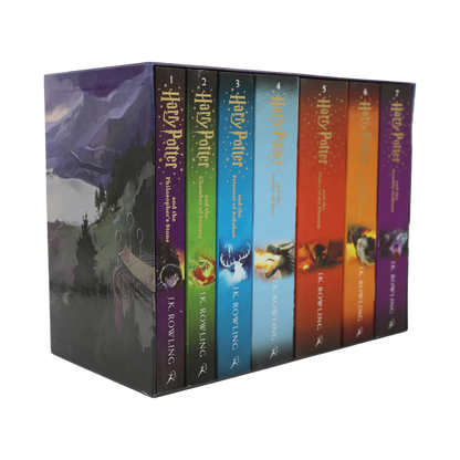 Box set of 'Harry Potter' books with colorful covers on a white background