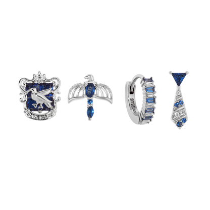 Set of silver and blue gemstone jewelry pieces on a white background