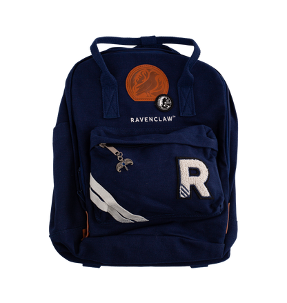 Navy blue backpack with 'Ravenclaw' emblem on a white background