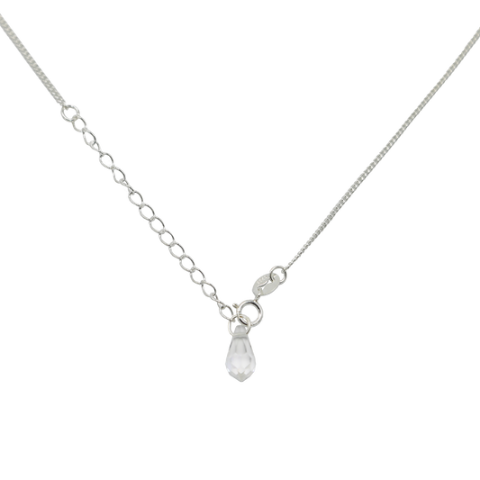 Silver necklace with a teardrop-shaped pendant on a white background