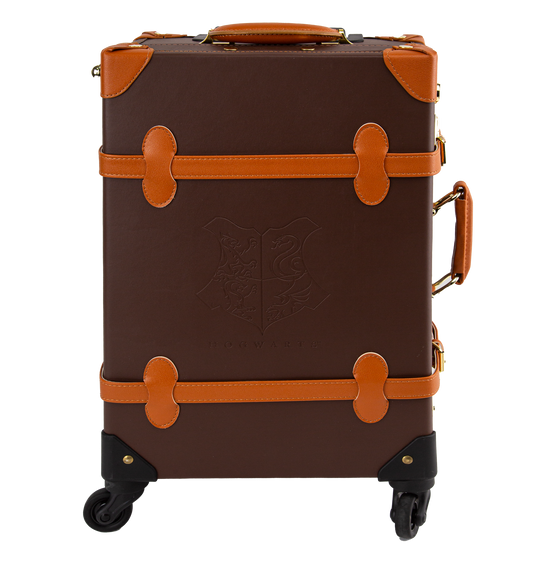 A brown travel case with orange handles and straps, featuring gold-plated clasps and a print of the Hogwarts house crest on the interior.