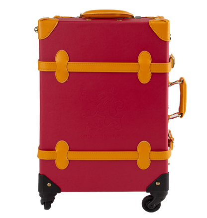 A red and yellow Gryffindor travel case with gold-plated clasps and canary yellow handles, featuring the Gryffindor house crest on the front.